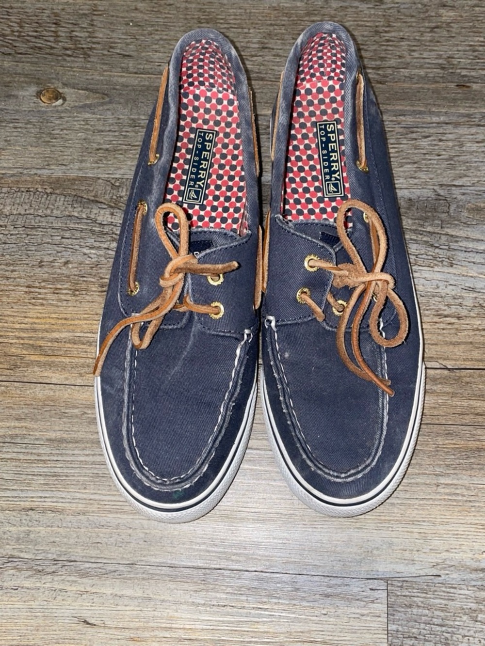 Sperry women’s Navy Canvas Boat Shoes with Brown Laces